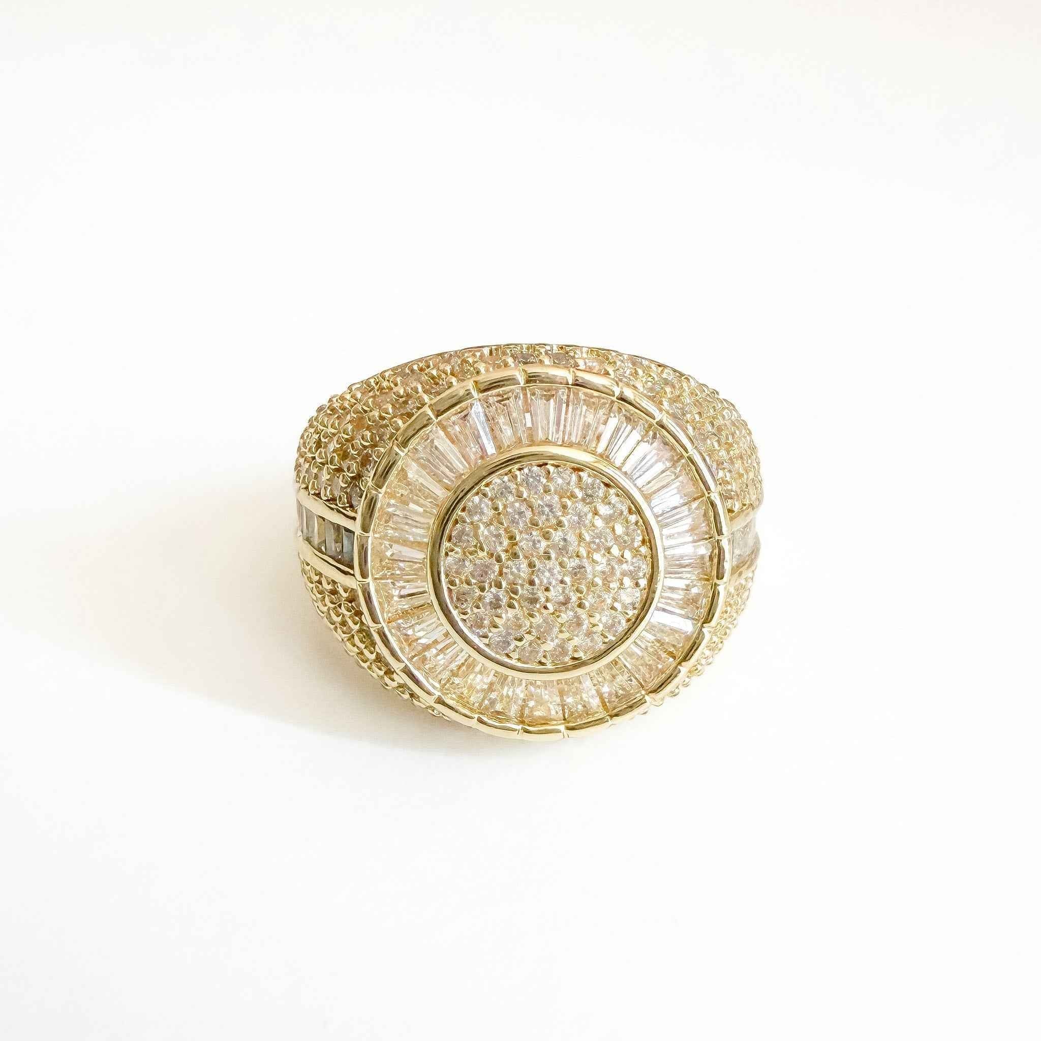 Gold-tone signet ring with round pavé CZ center and scalloped halo detail