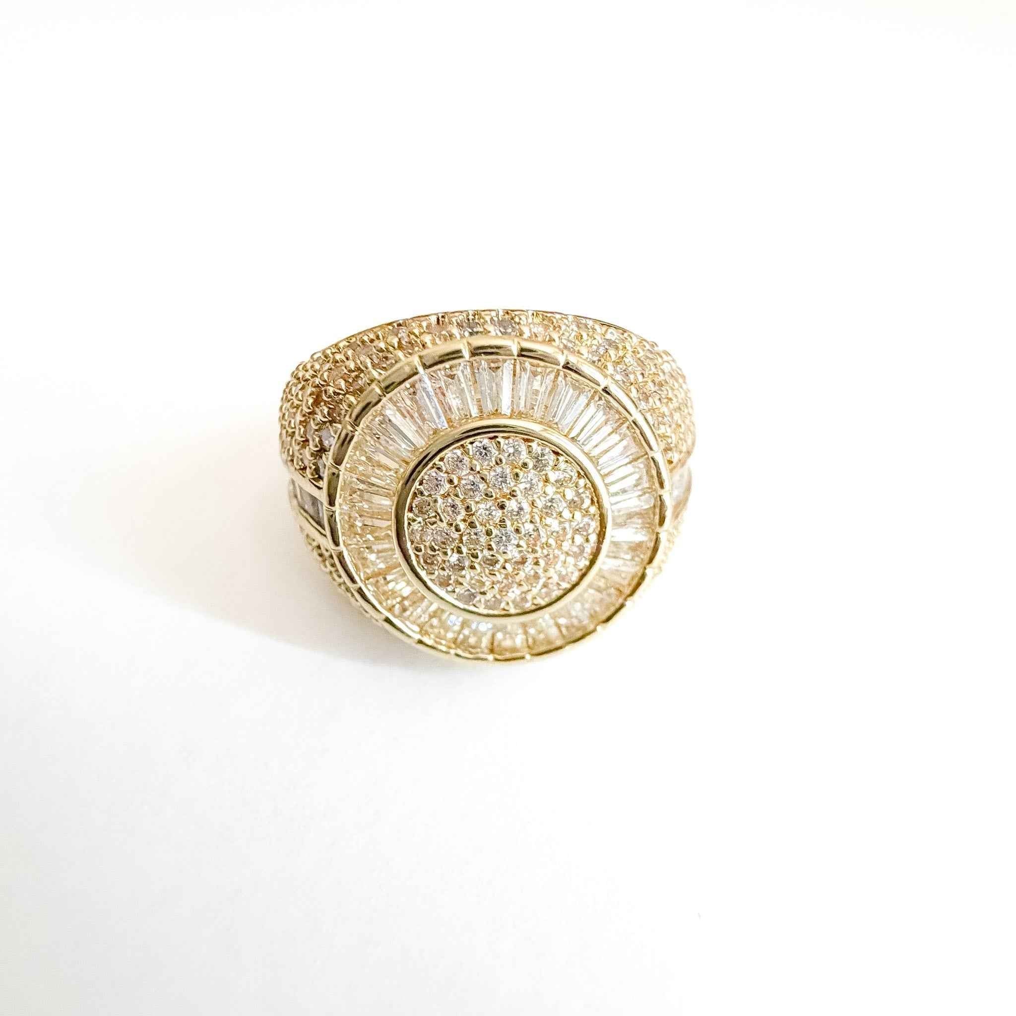 Gold-tone signet ring with pavé CZ oval center and outer curved CZ bezel