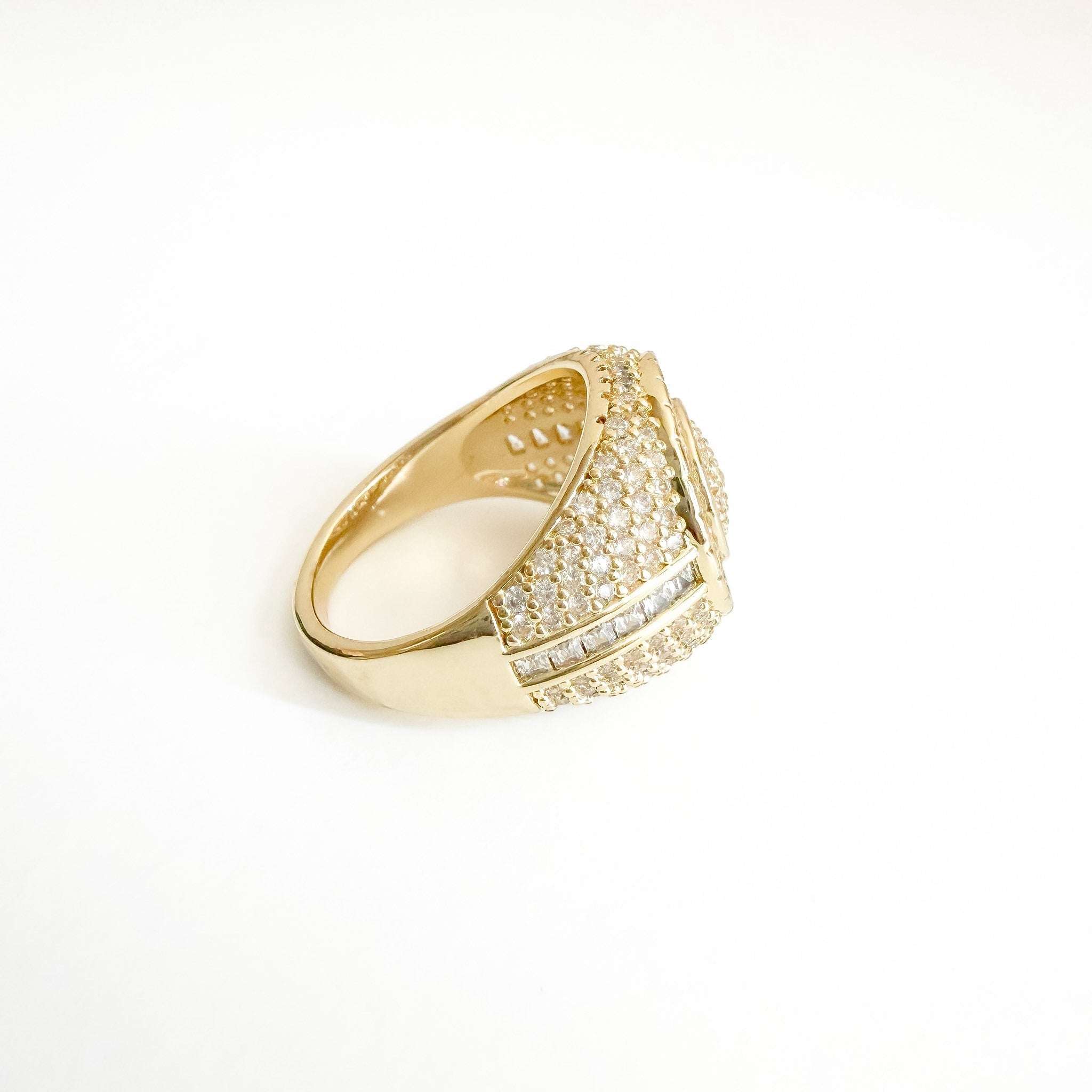 Gold-tone signet ring side view with pavé CZ in two stacked rows on the shoulder