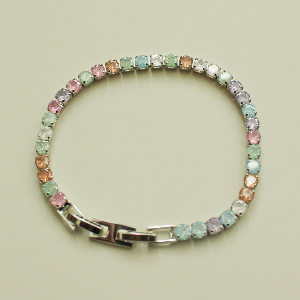Multicolor CZ tennis bracelet in a round shape with pastel stones and clasp