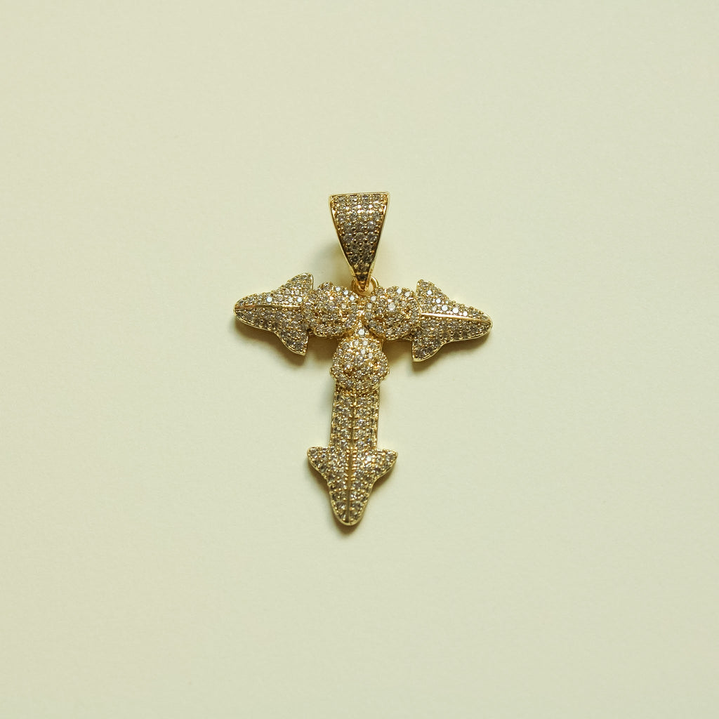 Gold-tone crystal-studded cross pendant with round center and three pointed arms